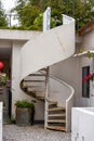 Close-up of white spiral staircase outdoors in villa Royalty Free Stock Photo