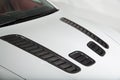 Close up of white sports car bonnet Royalty Free Stock Photo