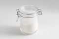 close up of white sugar glass jar on table Royalty Free Stock Photo