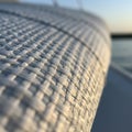 Close-up of a white textured surface with a woven pattern, possibly made of synthetic Royalty Free Stock Photo