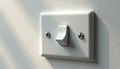 Close up of white toggle light switch on textured white wall. Two polished screws secure rectangular plate. Domestic device Royalty Free Stock Photo