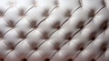 A close up of a white upholstery