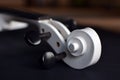 Close up of a white violin scroll with black pegbox on blurry background Royalty Free Stock Photo