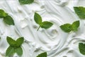 Close-up of white whipped cream texture with mint leaves Royalty Free Stock Photo