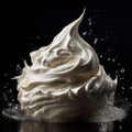 A close-up of white whipped cream with water splaters on black background Royalty Free Stock Photo