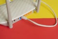 Close up white wi-fi router on the color background f Royalty Free Stock Photo