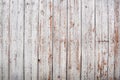 Close up of white wooden fence panels.