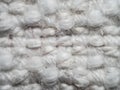 Close up of white woven textured fabric