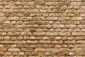 Close-up white yellow and brown tinted old brick wall Royalty Free Stock Photo