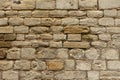 Close-up white and yellow tinted sandstone wall Royalty Free Stock Photo