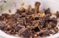 Close-up of white yogurt and pieces of brown chocolate, health f