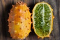 Close up of whole and half kiwano fruit