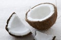 Close up of whole raw coconut cracked open