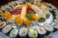 Close-up wide-angle view of a platter of various Japanese sushi