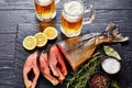 Close-up of wild salmon, fresh foamed beer Royalty Free Stock Photo