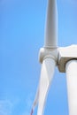 Close-up of wind turbine against blue clear sky Royalty Free Stock Photo