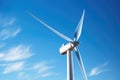 a close-up of a wind turbine against a clear blue sky Royalty Free Stock Photo