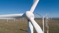 Close up wind turbine. Windmill for electric power production. Green energy.  Renewable energy Royalty Free Stock Photo