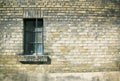 Close up of a window on weatherd brick wall Royalty Free Stock Photo