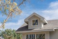 Close-up windows on second story of North American house in fall Royalty Free Stock Photo