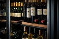 close-up of wine bottles organized in a smart wine fridge