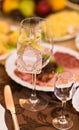 Close-up of wine glass and name card on festive table Royalty Free Stock Photo