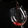 close up wine pouring into glass. High quality beautiful photo concept Royalty Free Stock Photo