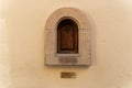 Close-up of a wine window on a light beige wall, Florence, Italy Royalty Free Stock Photo