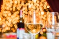 Glass of white wine with blurred background Royalty Free Stock Photo