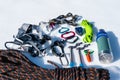 Close-up of winter climbing equipment on fresh snow on a sunny day. Carbines with a rope gazebo and zhumar as well as