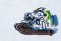 Close-up of winter climbing equipment on fresh snow on a sunny day. Carbines with a rope gazebo and zhumar as well as