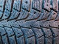 Close-up of winter studded car tyre protector Royalty Free Stock Photo