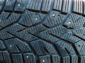 Close-up of winter studded car tyre protector Royalty Free Stock Photo