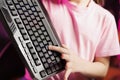 Close up on wireless Bluetooth mechanical keyboard hold by young internet star filming review Royalty Free Stock Photo