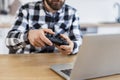 Close up of wireless joystick of young Caucasian man. Royalty Free Stock Photo