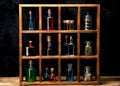 Close up of witch shelves with potion bottles. Medieval alchemist laboratory with various kind of flasks