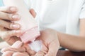 Close up woman applying lotion on hand, Beauty and Healthcare co