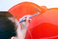 Woman paint little car Royalty Free Stock Photo