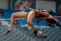 close-up woman athlete high jump in summer athletics championships Royalty Free Stock Photo