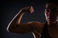 Close up of woman back with her muscles after workout. Female bodybuilder with perfect biceps Royalty Free Stock Photo