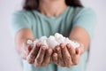 Close up woman beautiful hands holding white sugar cubes. Healthcare concept Royalty Free Stock Photo