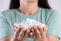 Close up woman beautiful hands holding white sugar cubes. Healthcare concept Royalty Free Stock Photo