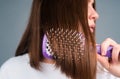 Close Up Woman Brushing Hair With Comb. Beautiful Girl With Long Hair Hairbrush.