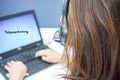 Woman callcenter with headset on job with laptop Royalty Free Stock Photo