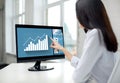 Close up of woman with chart on computer in office