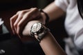 Close up Woman checking time her watch AI generated Royalty Free Stock Photo