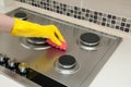 Close up of woman cleaning cooker at home kitchen Royalty Free Stock Photo