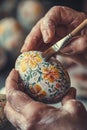 Close-up of a woman coloring eggs for Easter. Selective focus Royalty Free Stock Photo