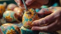 Close-up of a woman coloring eggs for Easter. Selective focus Royalty Free Stock Photo