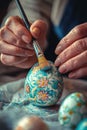 Close-up of a woman coloring eggs for Easter. Selective focus Royalty Free Stock Photo